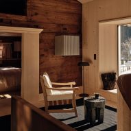 Gerold and Katia Schneider transform 17th-century Alpine lodge into wood-clad hotel