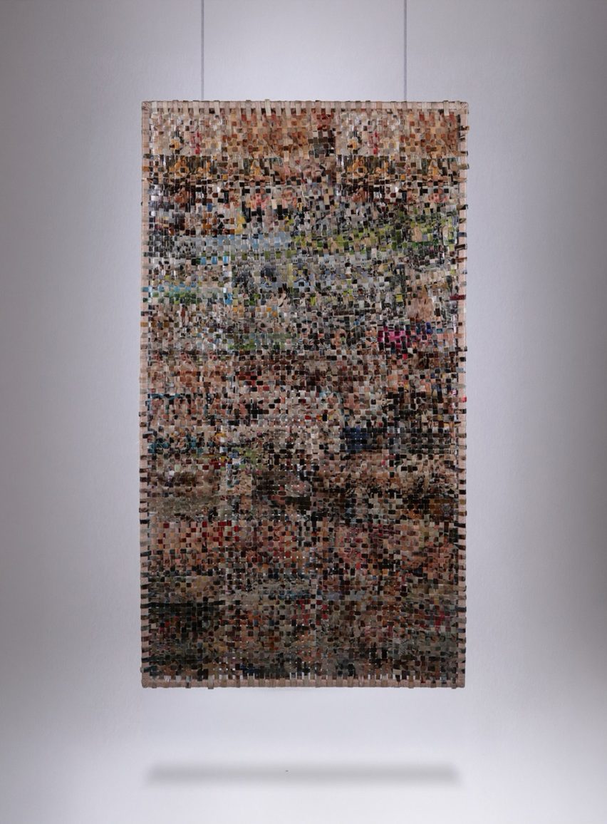 Image of a weaved rectangular material hanging from the ceiling.