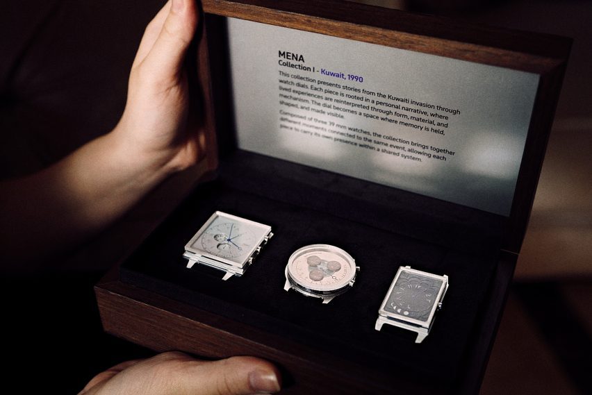 Image of a person opening a box with three silver watch faces, all of a different shape.