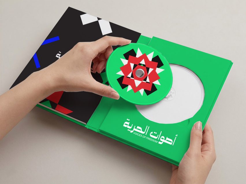 Image of someone holding a green circle cut-out from a decorative book.