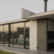 Casa Alba by Ademas Arquitectura, a concrete house with a wall for privacy