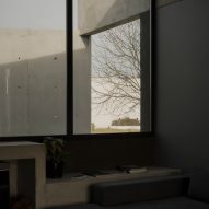 Casa Alba by Ademas Arquitectura, a concrete house with a wall for privacy