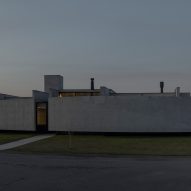 Casa Alba by Ademas Arquitectura, a concrete house with a wall for privacy