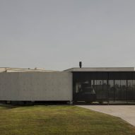Casa Alba by Ademas Arquitectura, a concrete house with a wall for privacy
