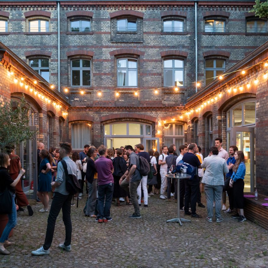 an image of people at a student exhibition
