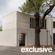 Ant&oacute;nio Bessa Cruz Architects replaces Porto car workshop with industrial-themed home
