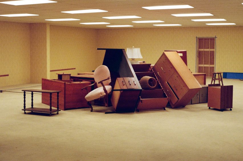 Behind-the-scenes photo of the Backrooms set showing furniture piled up in the middle of a room