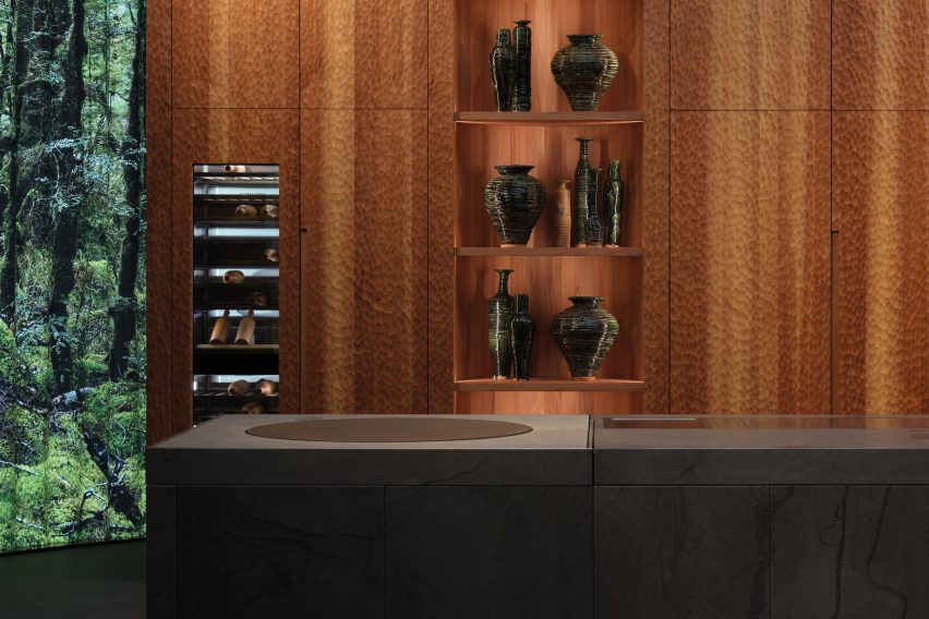 Wooden cabinet with ceramic vessels