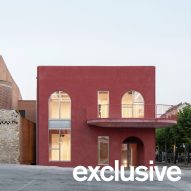 MACH designs red town hall in Spain to have "warm and welcoming presence"