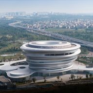 MAD clads bulbous science museum with silver-toned polymer panels in China