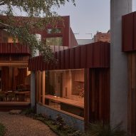 MRTN Architects extends Melbourne home with cluster of red-brick volumes