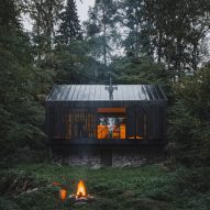 Mimosa Architects shapes Czech cabin from "rock, river and fire"