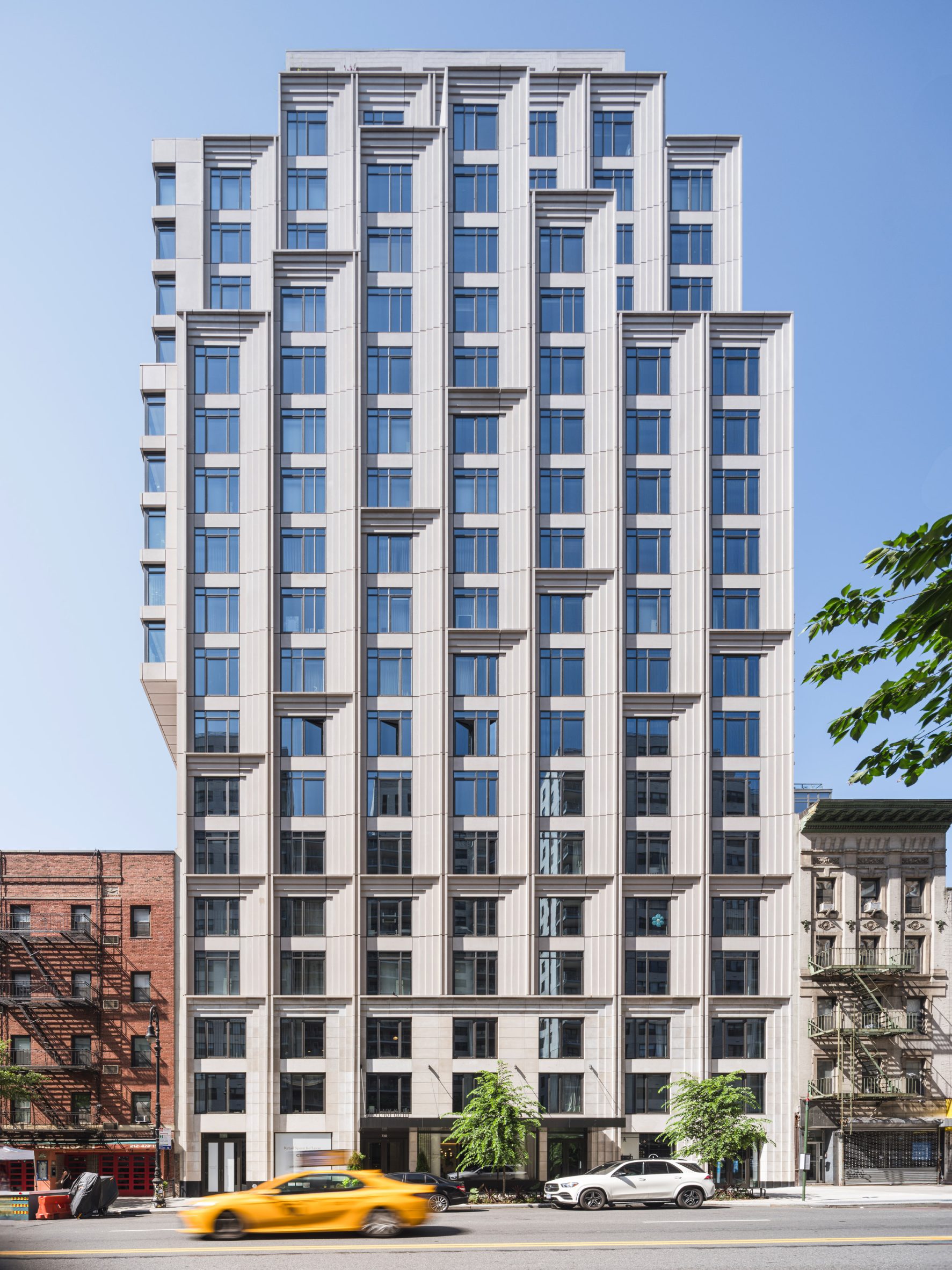 ODA clads Manhattan condo building in chamfered limestone