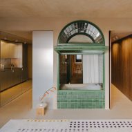 Bathtub takes centre stage in living room of Barcelona apartment