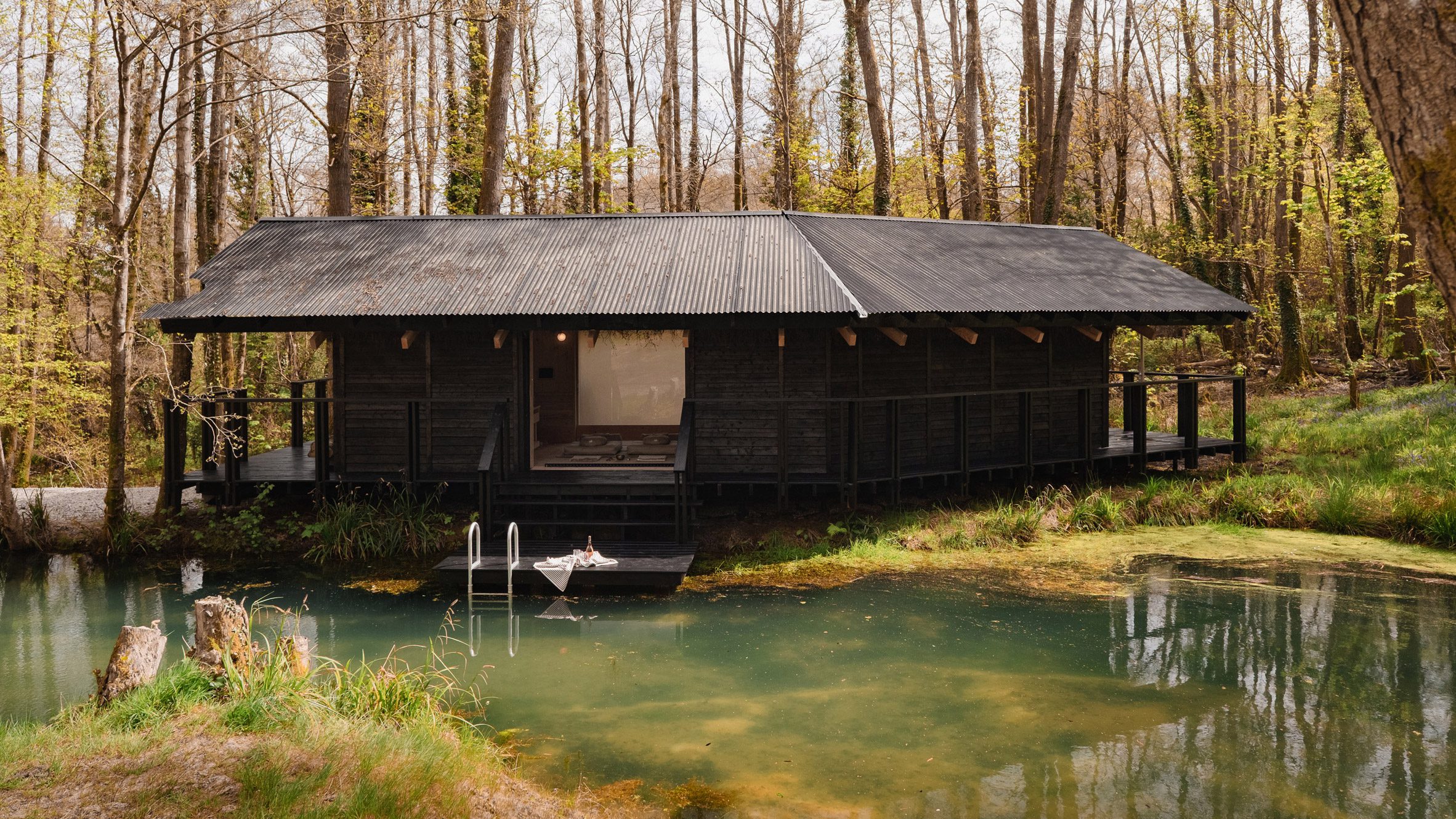 https://static.dezeen.com/uploads/2026/05/yogis-cabin-built-works-east-sussex-uk-residential-holiday-homes_dezeen_2364_hero.jpg