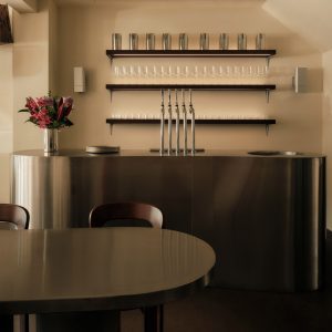 Curving communal table forms 