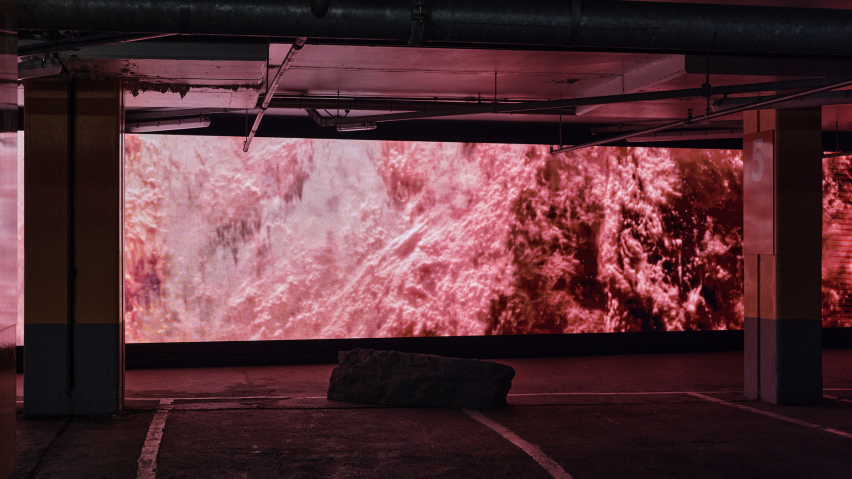 Red screen showing close up planet surface