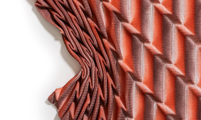 Image of a piece of red-patterned fabric.