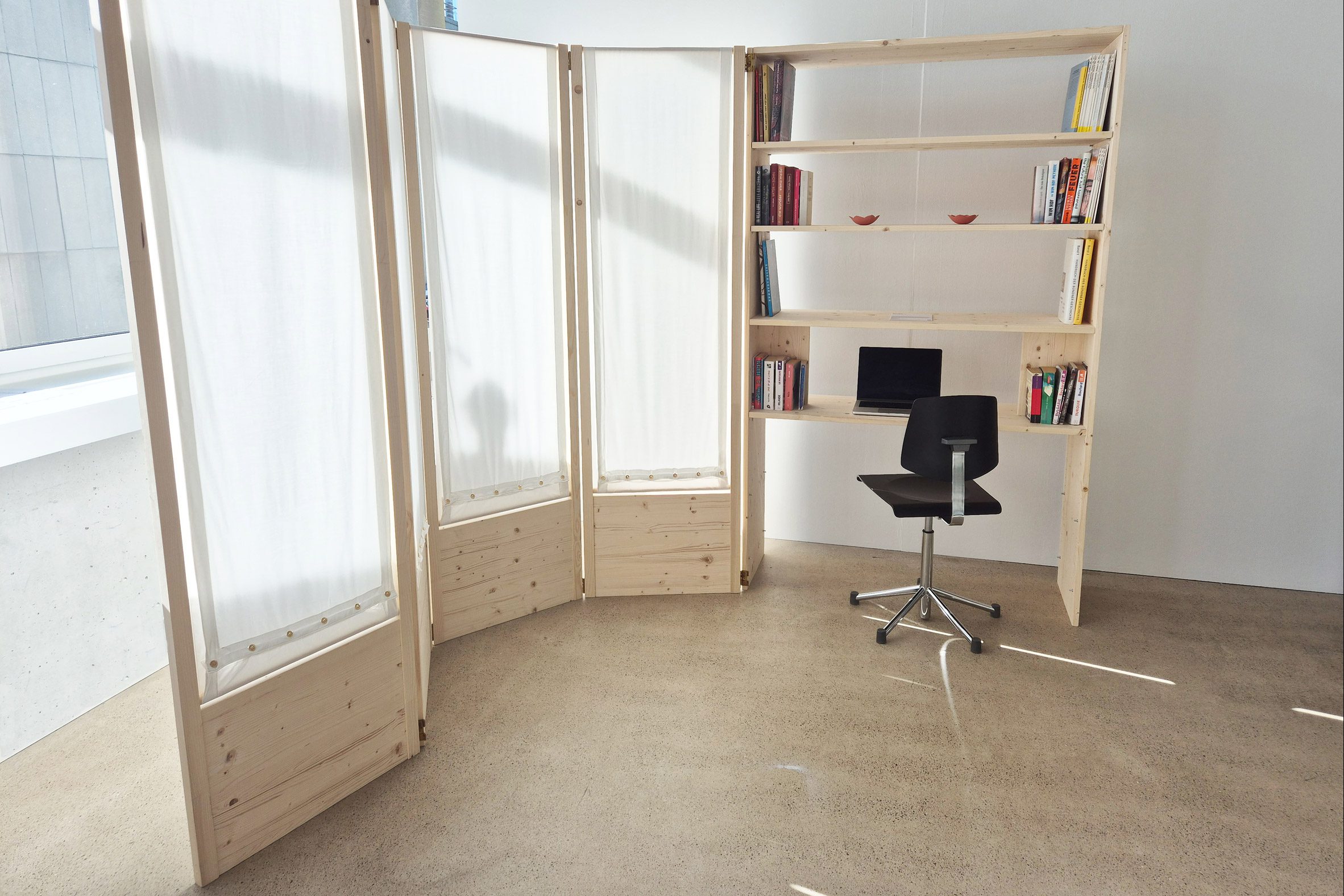 Photo of wooden screen and desk