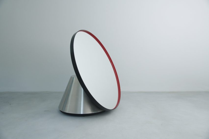 Image of a large sculptural mirror.