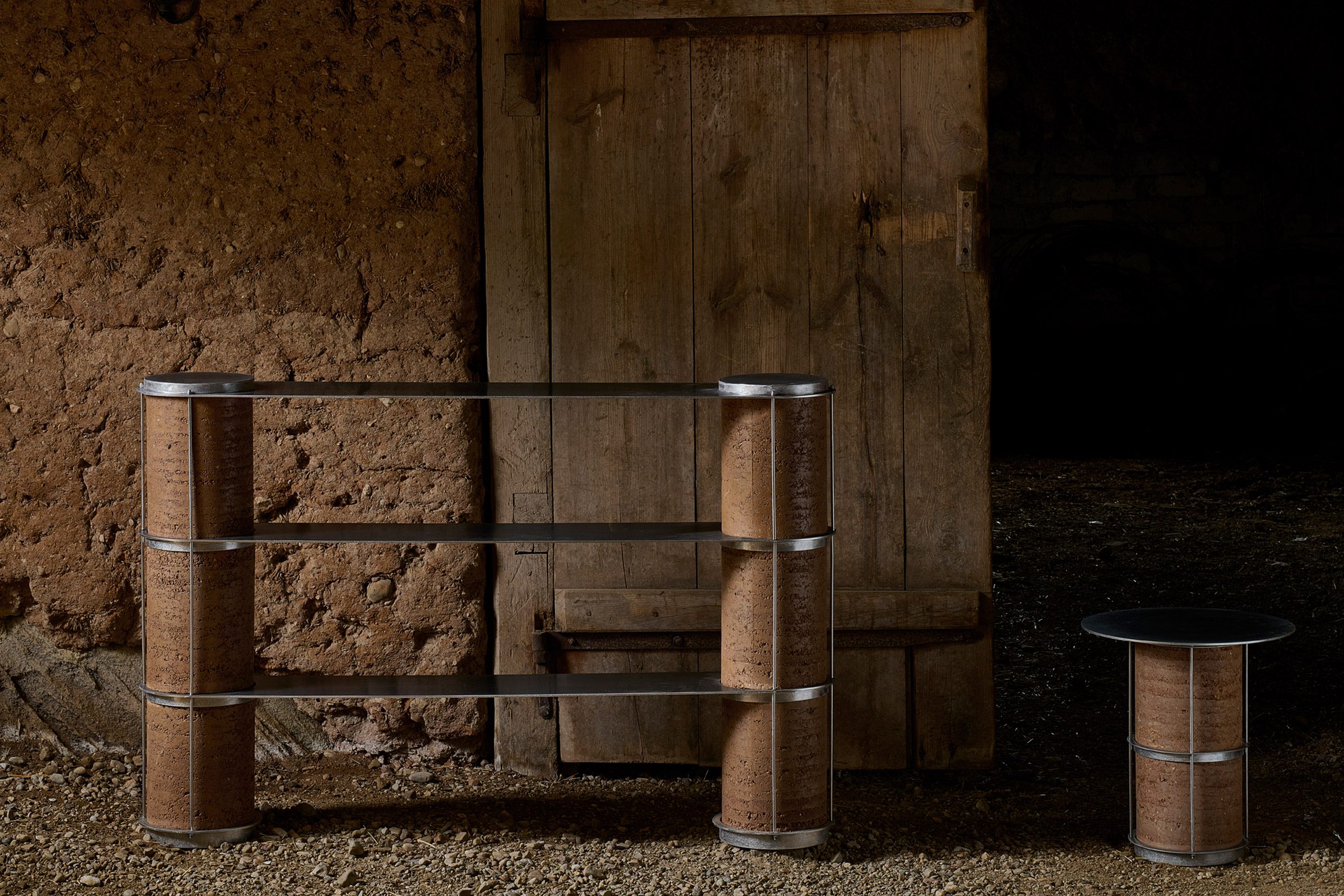 Image of a metal and cork shelving unit and a matching side table.