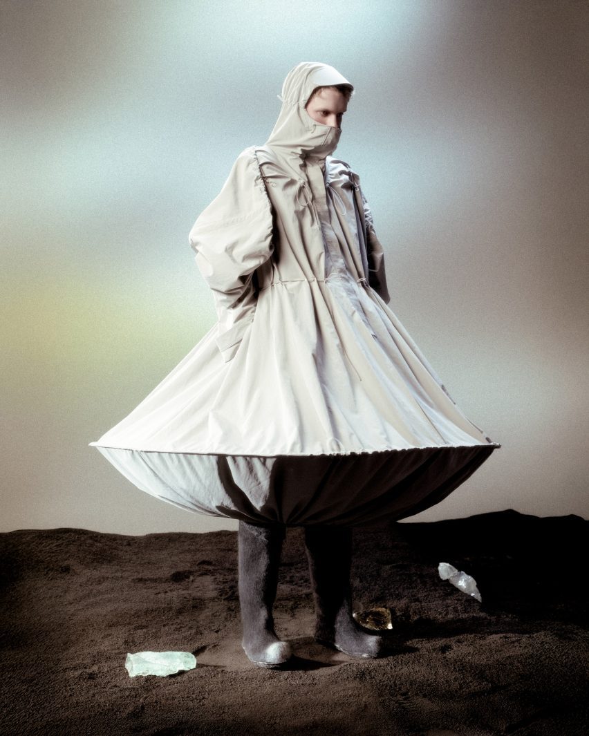 Photograph of a model wearing a structural piece of clothing.