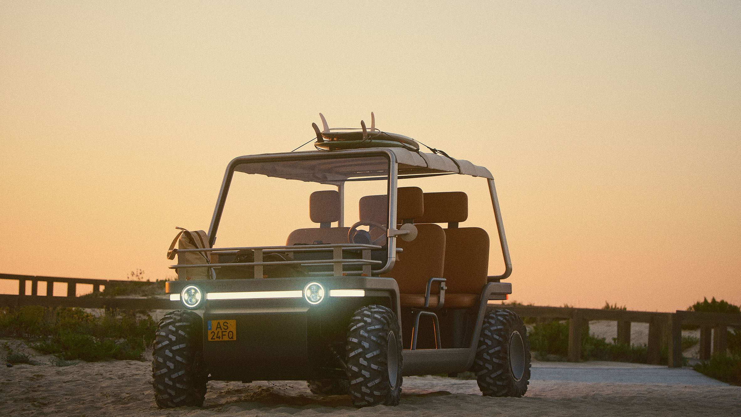 Golf cart, small car and moon buggy meet in electric Amble One