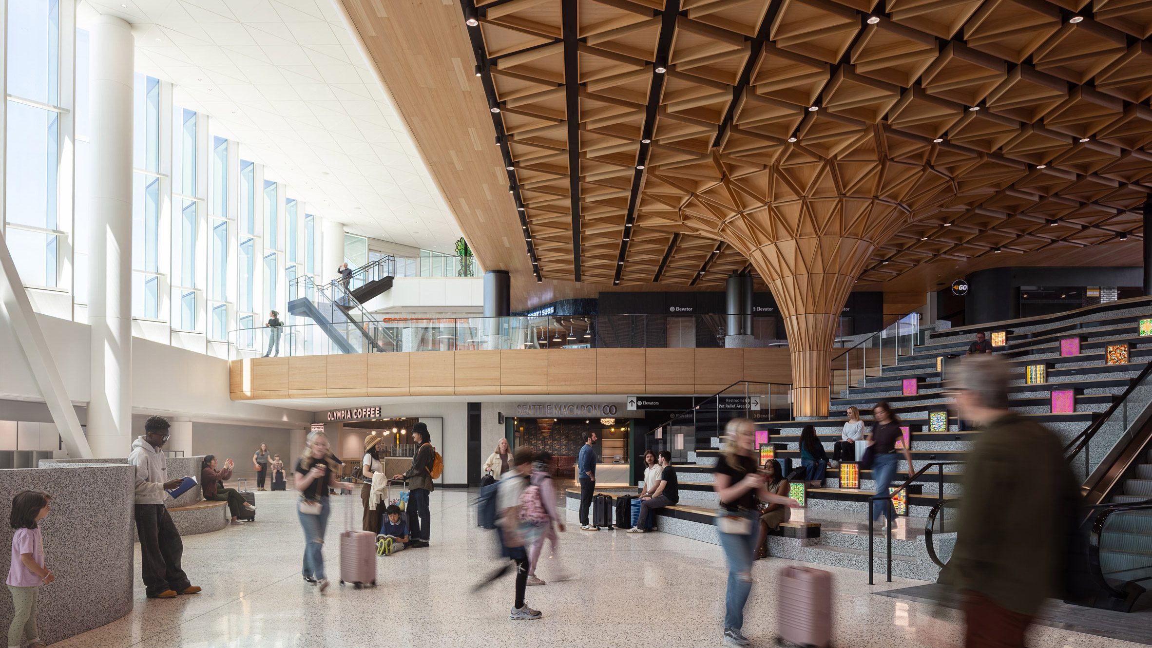 https://static.dezeen.com/uploads/2026/06/c-concourse-expansion-seattle-airport-miller-hull-woods-bagot_dezeen_2364_hero.jpg