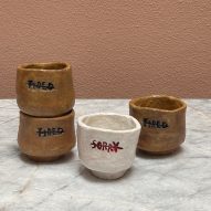 Willem van Hooff etched the words "sorry" and "tired" into his designs