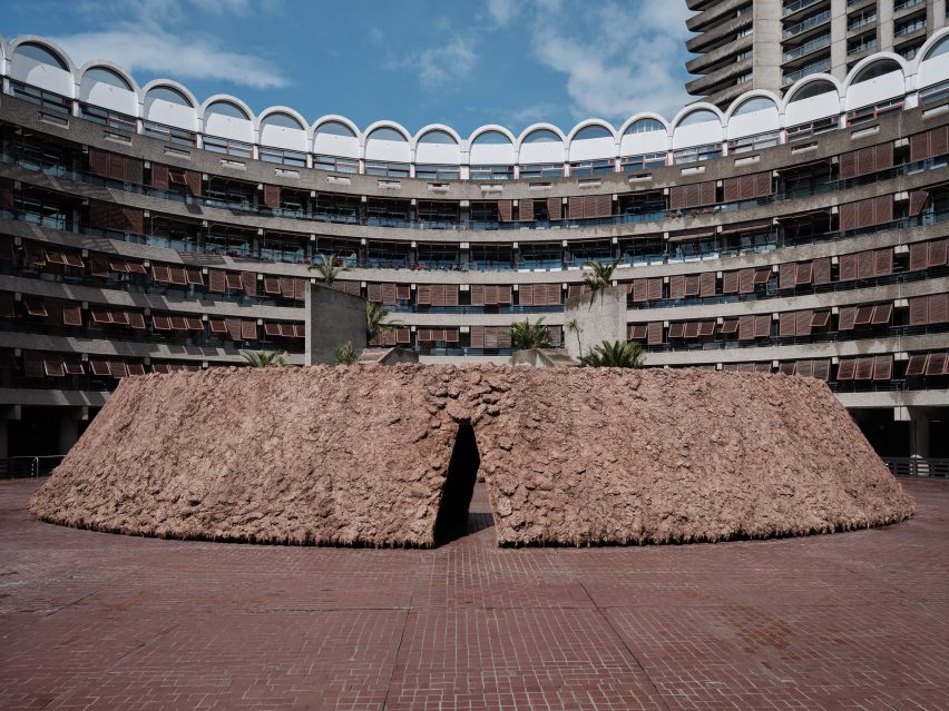 Exterior view of soil sculpture by Delcy Morelos