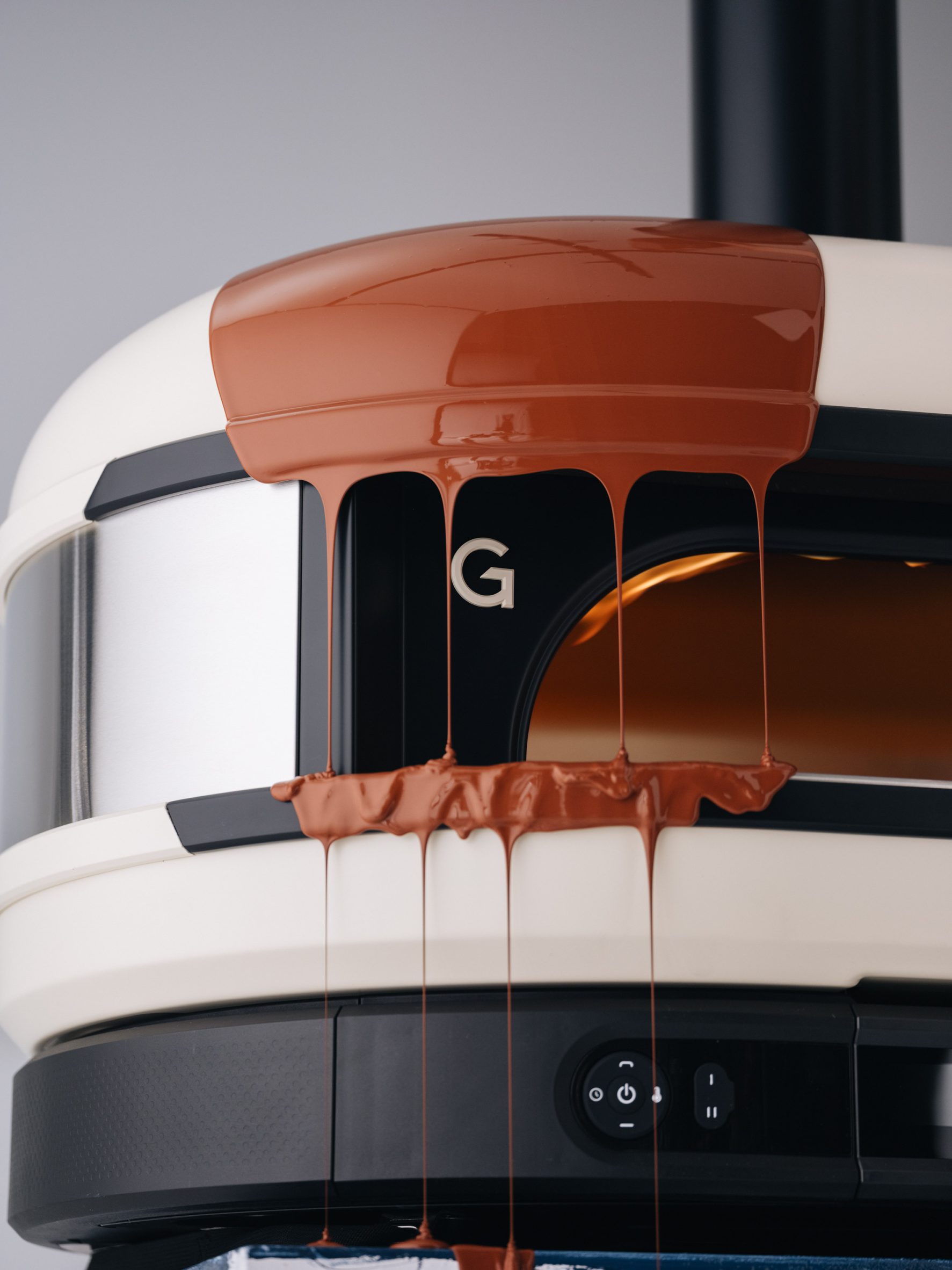 Dome XL (Gen 2) pizza oven in Black Orange by Gozney and Tonester