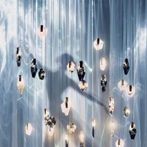 Bomma creates "crystal cloud" installation from discarded glass