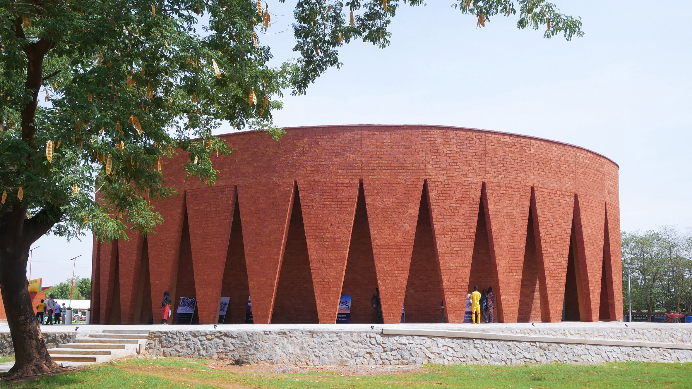 https://static.dezeen.com/uploads/2026/06/francis-kere-building-stories-interview-hero_dezeen_2364_col_0.jpg
