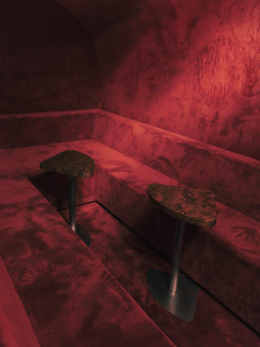 Red velvet booth designed by Golem