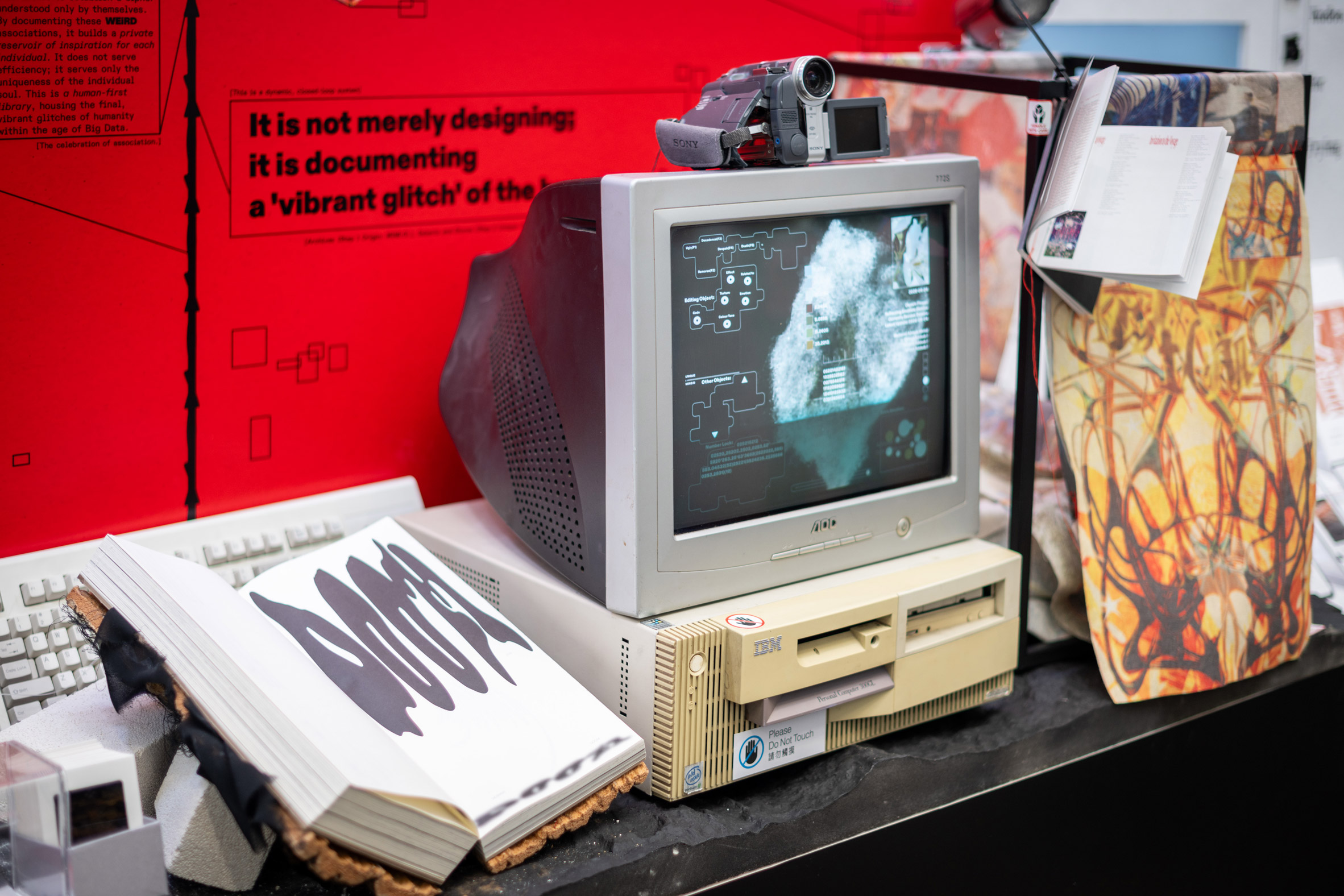Old style television on display with camera on top