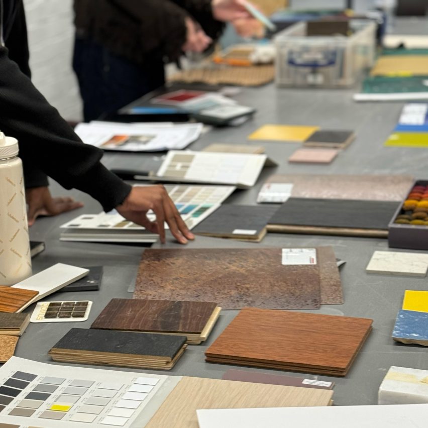 Students touching material samples