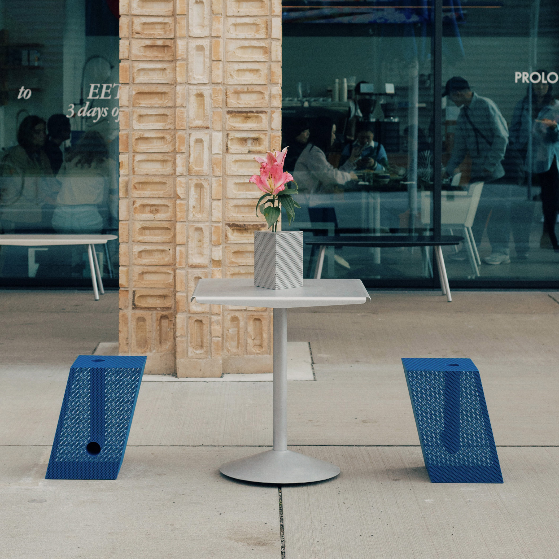 Metal seats next to metal table