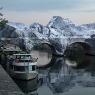 Wind damage delays opening of JR's Pont Neuf inflatable in Paris