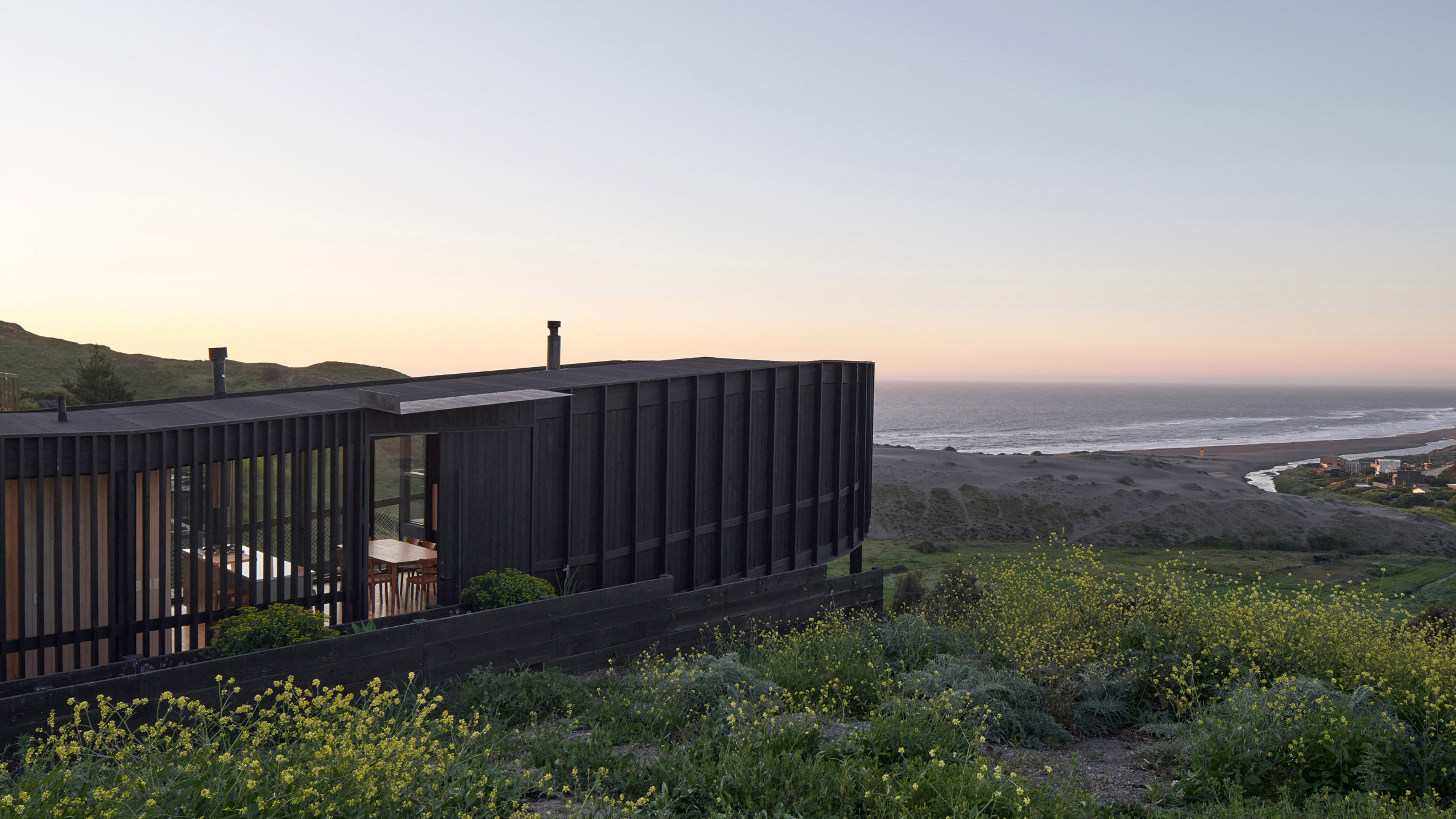 https://static.dezeen.com/uploads/2026/06/la-negrilla-house-croxatto-and-opazo-architecture-residential-chile_dezeen_2364_hero.jpg