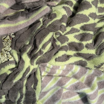 image of green and brown knitted textiles