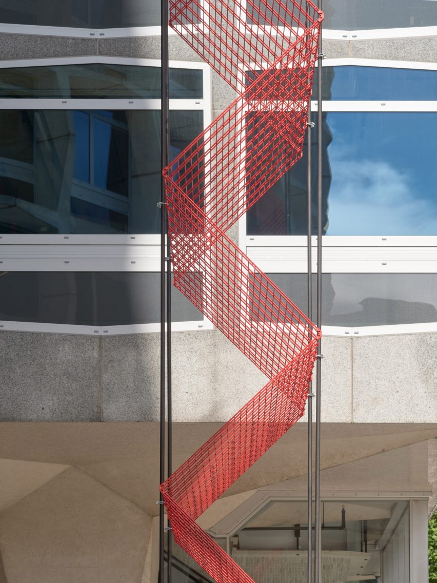 Red metal tower outside Space House in London
