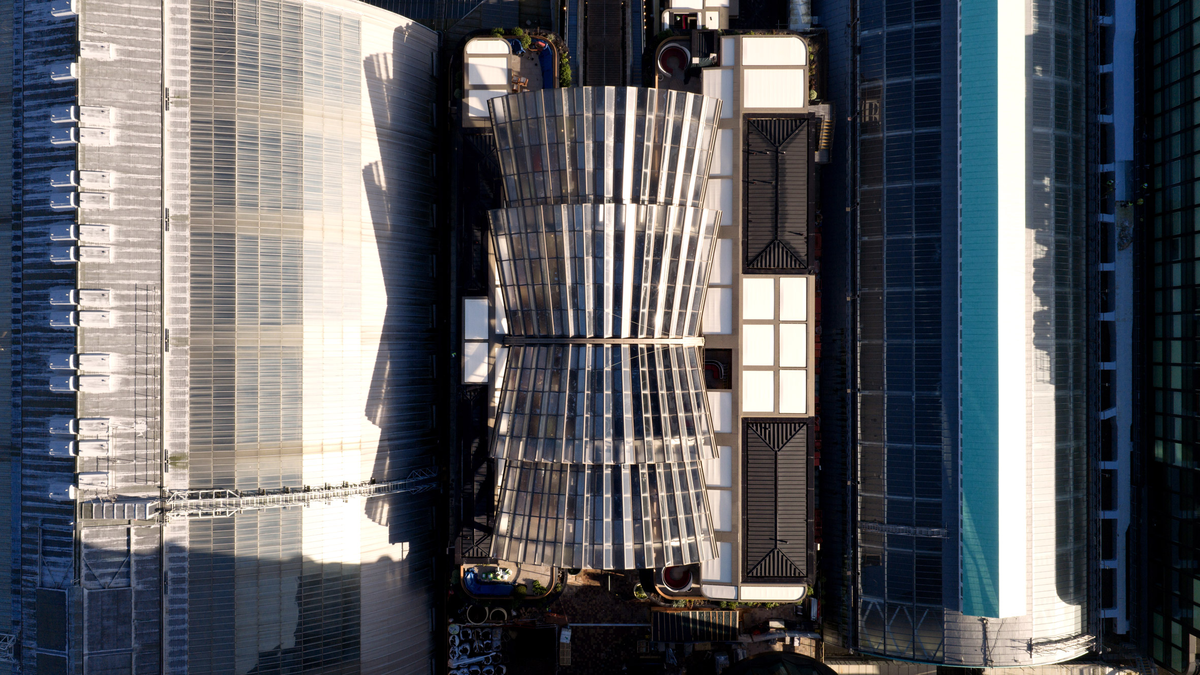 Glass canopy at Olympia in London by Heatherwick Studio and SPPARC