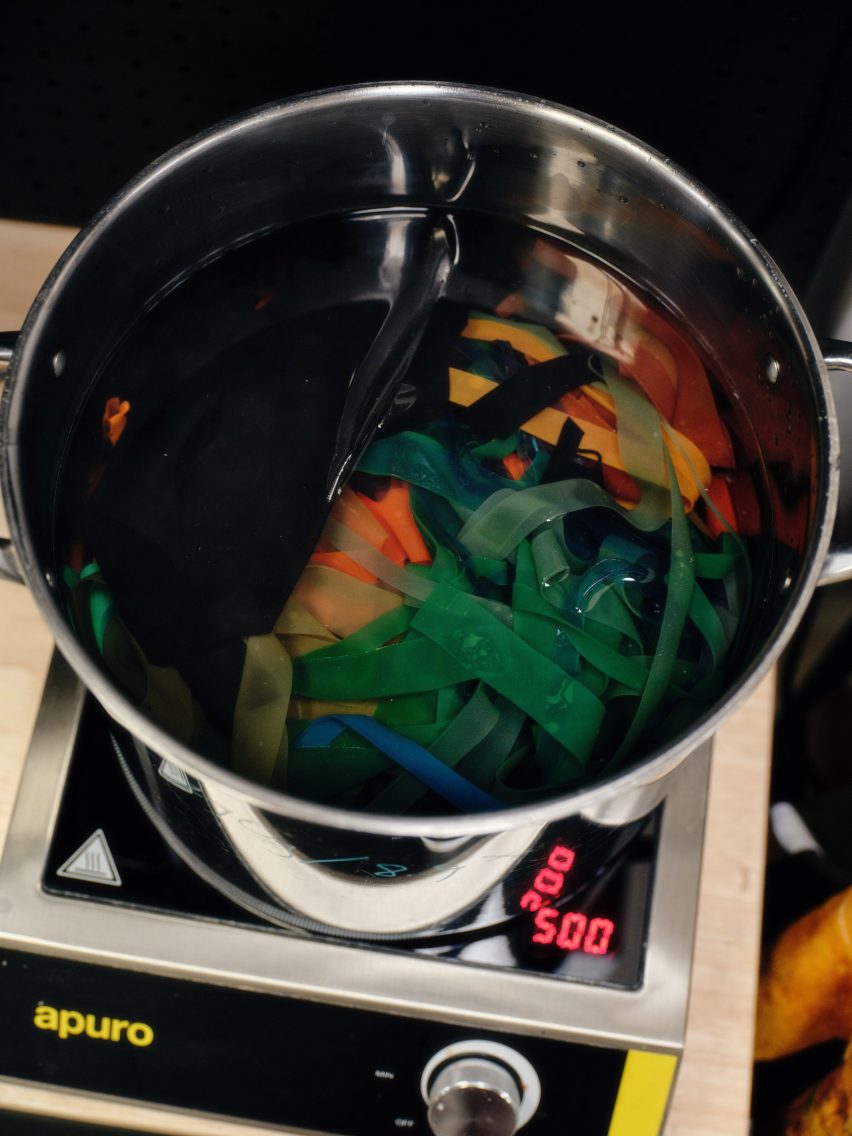 Photo of the Other Matter Leather-making process with strips of coloured plastic film in a big pot of water on a hob
