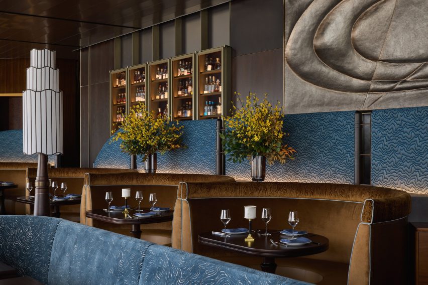 Soft blue and warm brown suede covers restaurant booth seating