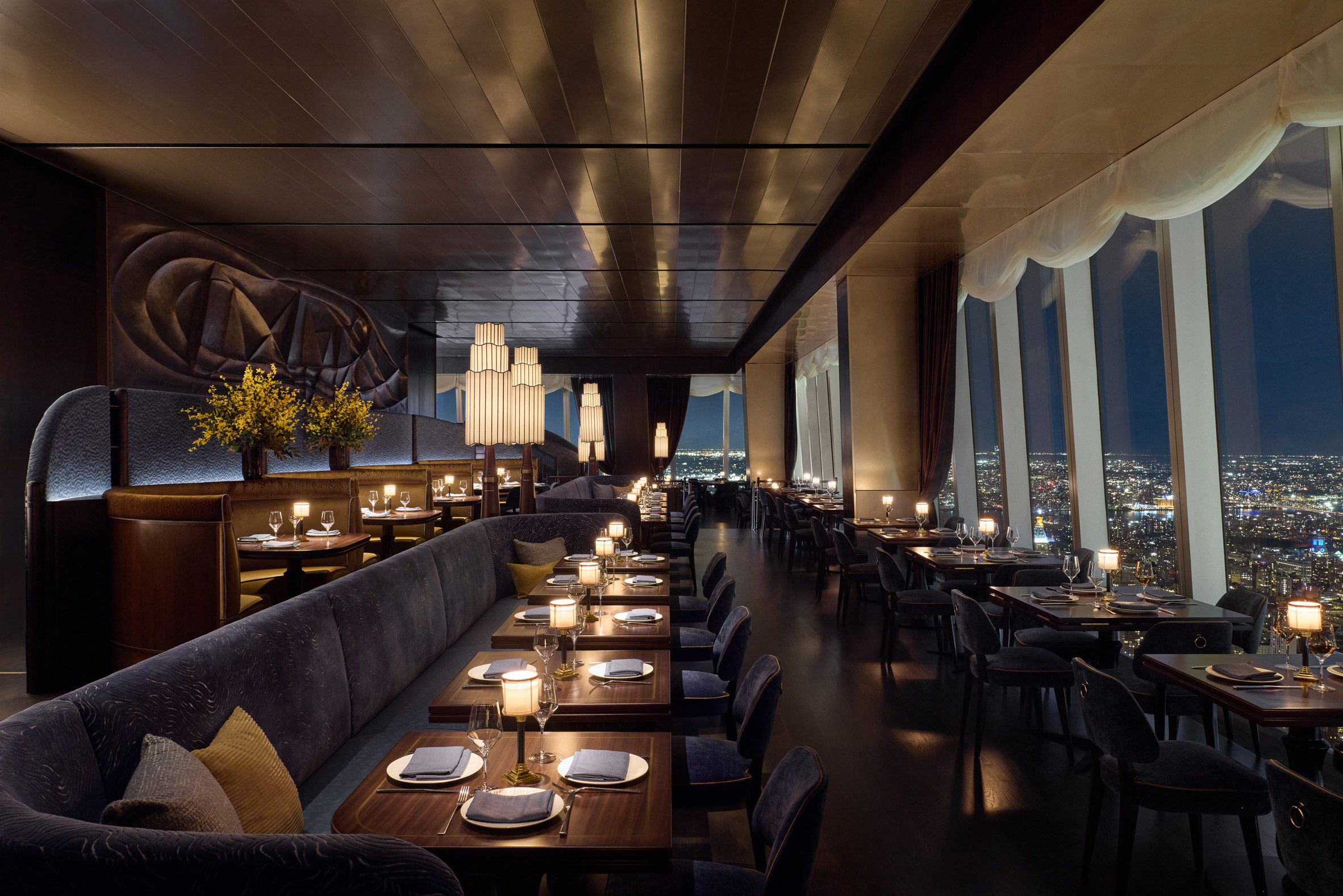 The interiors of Peak by Priceless overlooking Manhattan