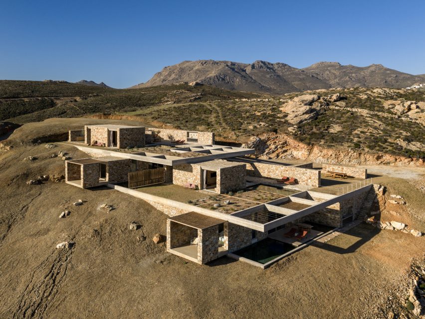 Stone retreat integrated into the hillside landscape on Serifos