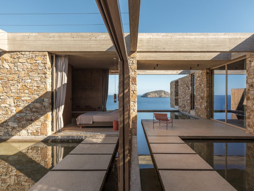 Stone-clad guest suites arranged around shallow reflecting pools