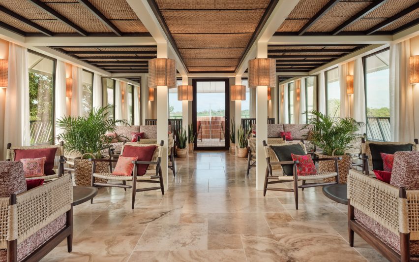 Locally sourced wood, stone and textiles in the upper deck bar