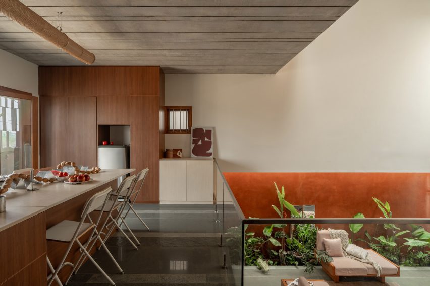 Splitscape Residence by SpaceDNA kitchen on mezzanine