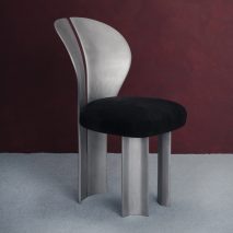 Studio NRG designs Lilium Chair out of recycled metal car rims